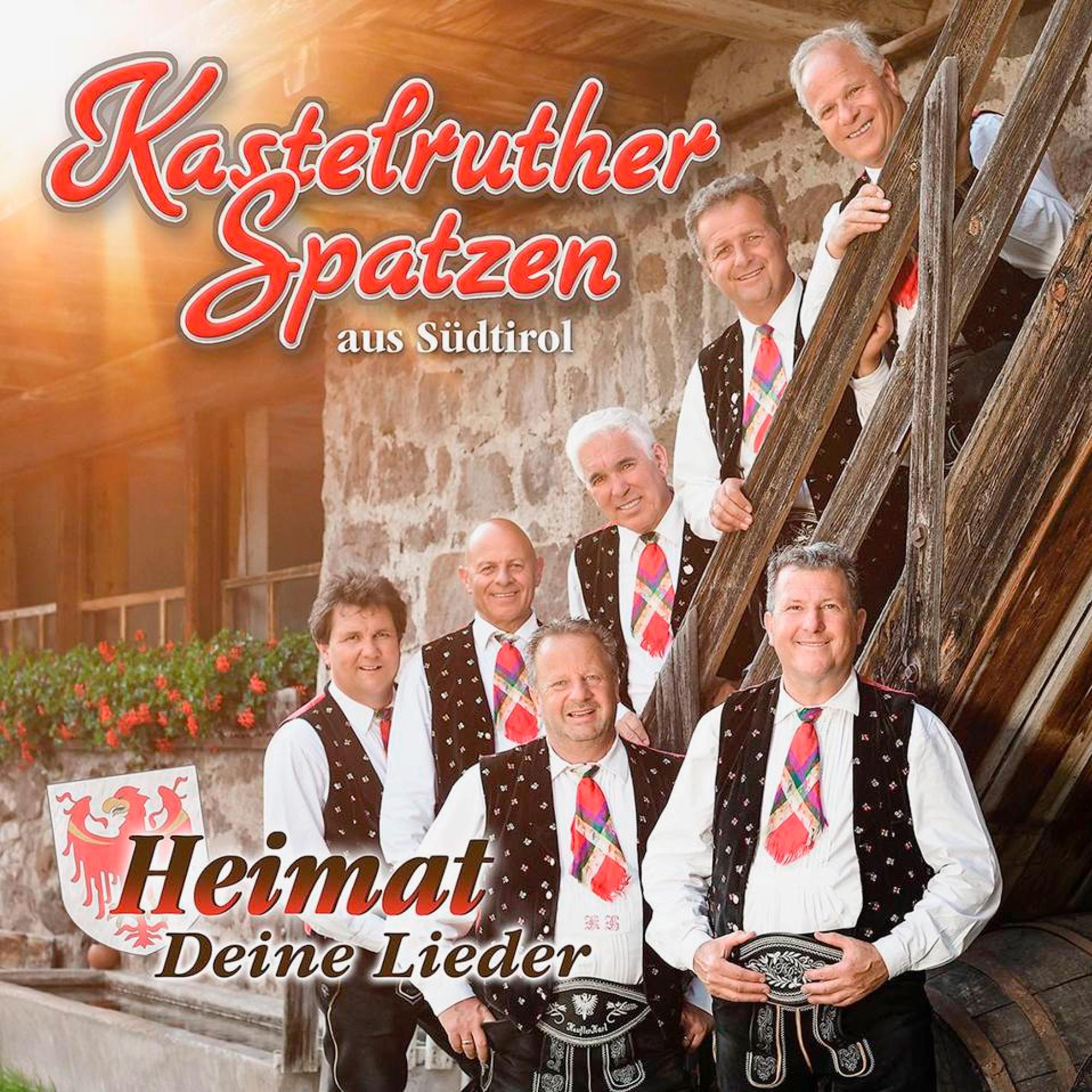 Albumcover mit einer Gruppe Männer in Tracht, Text 'Kastelruther Spatzen'.