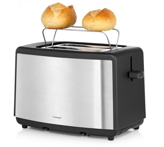 Ein Toaster aus Edelstahl mit zwei getoasteten Brötchen oben drauf.