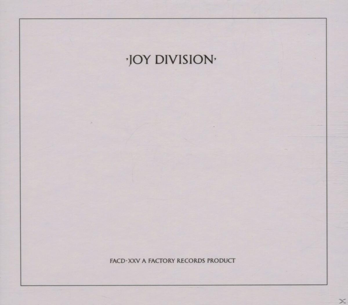 Albumcover mit dem Text 'JOY DIVISION' in der Mitte eines weißen Hintergrunds.