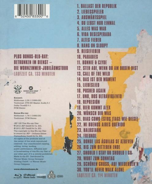 Rückseite einer Blu-ray-Hülle mit Titelliste, Konzertdetails und einer gelb/blauen Karte.