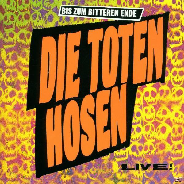 Albumcover mit orangefarbenem Die Toten Hosen-Text über einem Totenkopf-Hintergrund. Titel: Bis zum Bitteren Ende.
