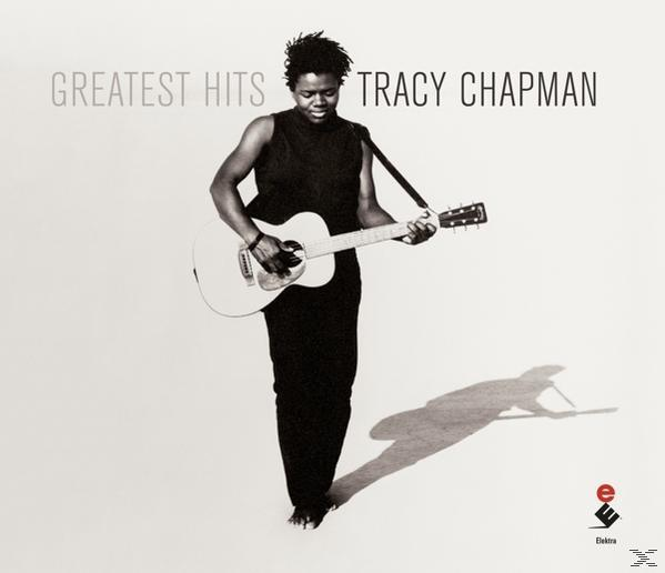 Albumcover von Tracy Chapman mit Gitarre, schwarzem Kleid und Schatten auf weißem Hintergrund. Text steht oben.