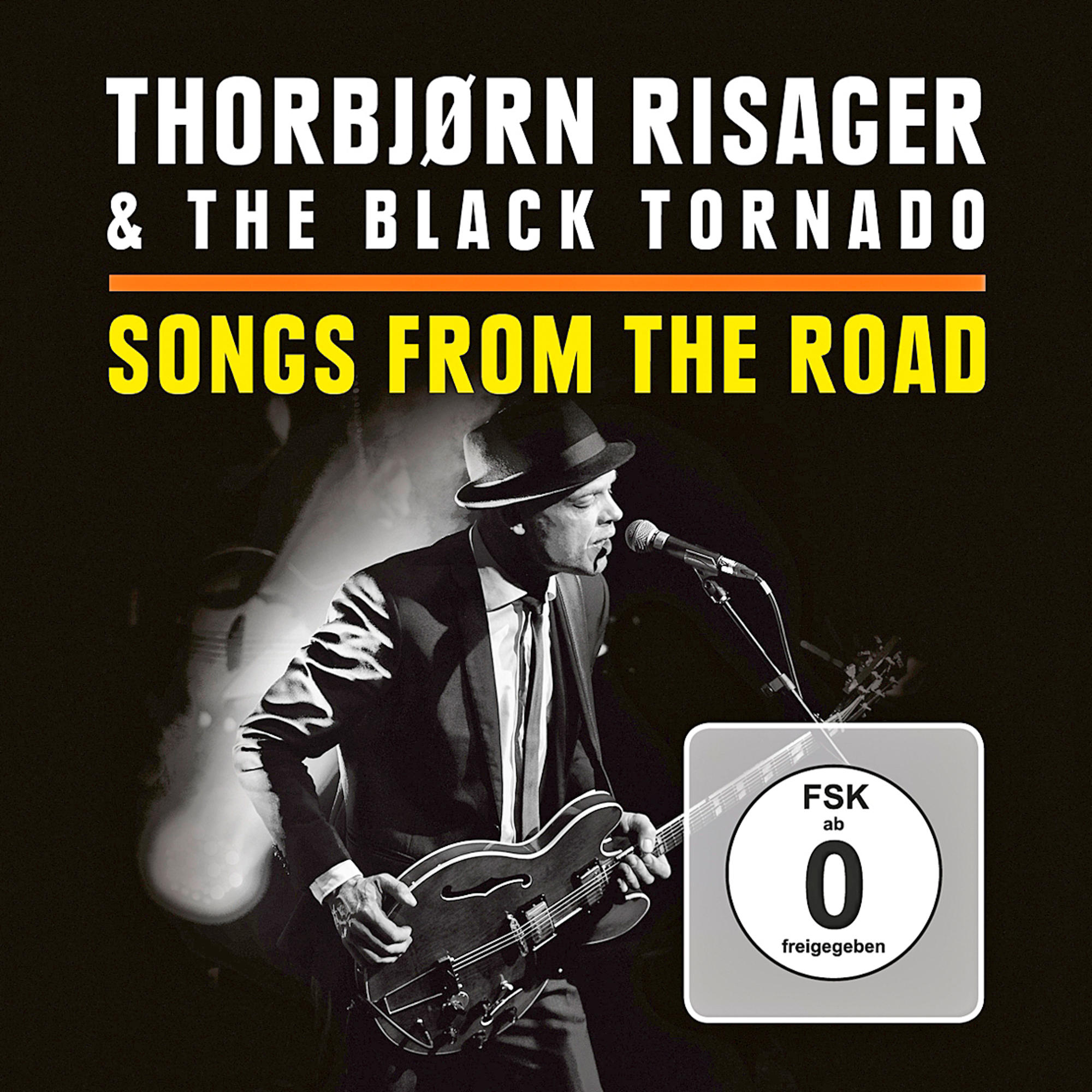 Albumcover: Thorbjørn Risager mit Gitarre auf der Bühne, Text oben: Songs From The Road.