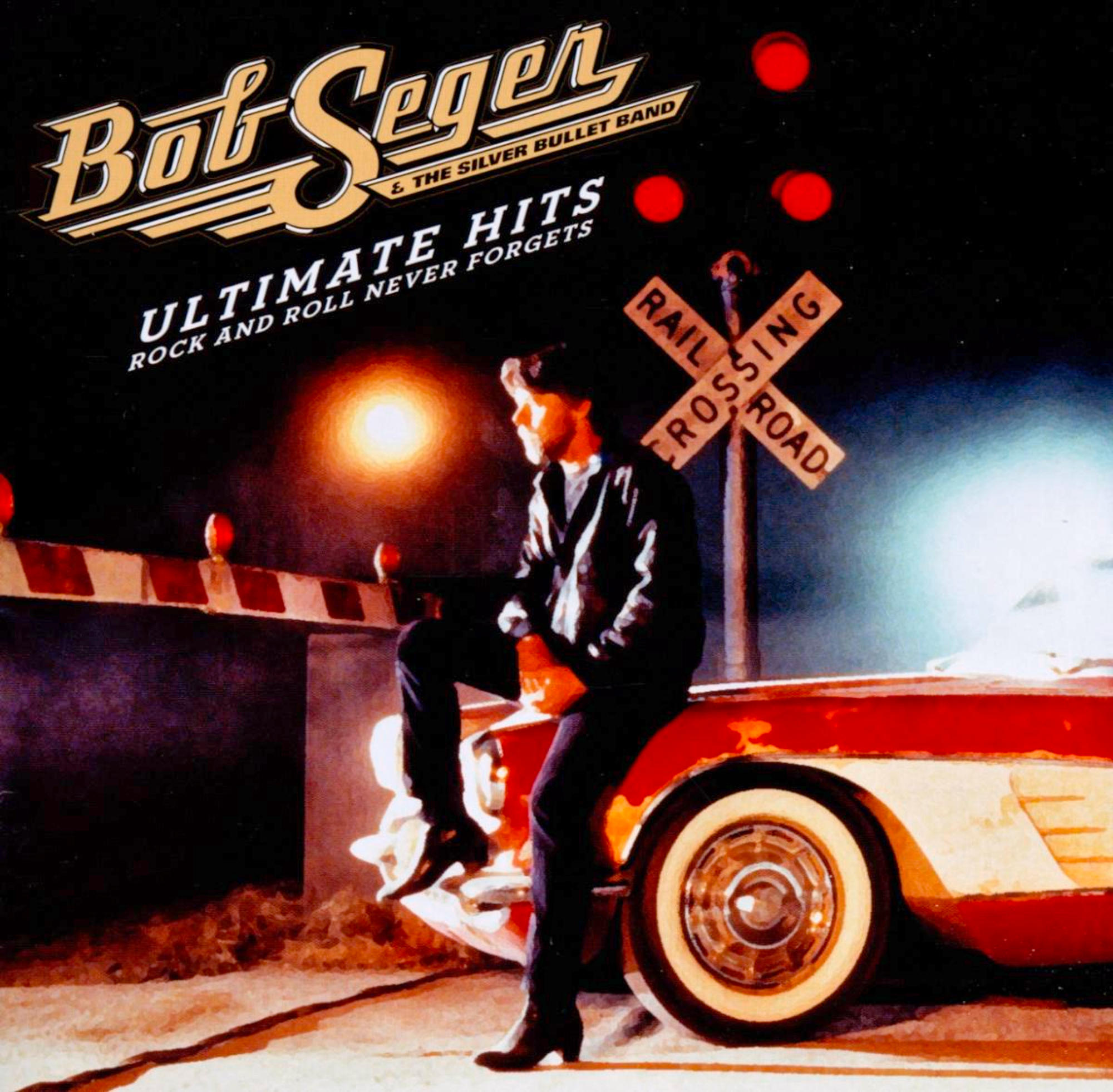 Album-Cover: Bob Seger, ein Mann sitzt nachts an einem Bahnübergang auf einem roten Auto.