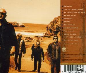 Rückseite eines Albums. Vier Männer gehen am Strand entlang. Die Titelliste befindet sich rechts. Hintergrund ist das Meer.