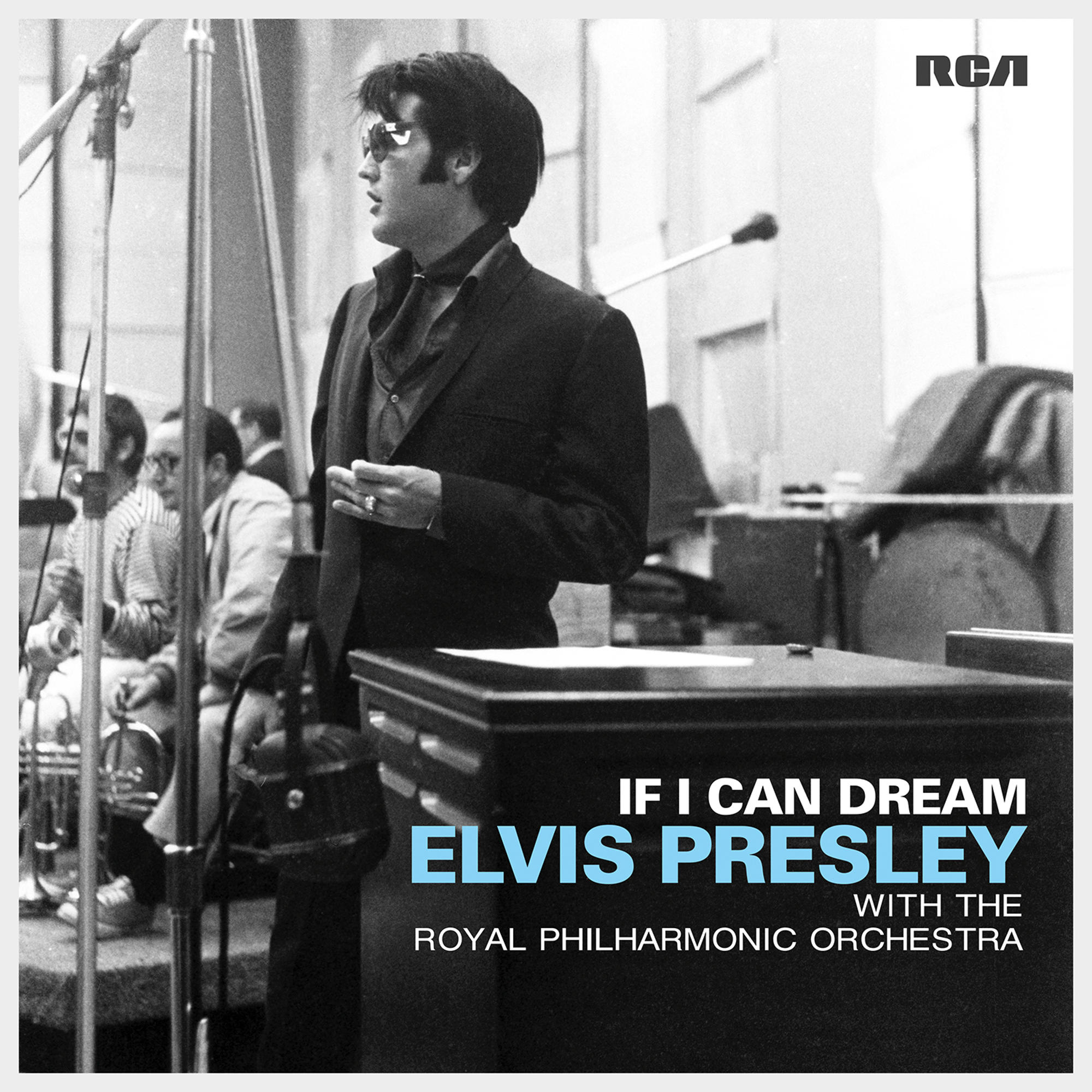 Elvis Presley Albumcover. Elvis in schwarzem Anzug mit Sonnenbrille, mit Text 'If I Can Dream'.