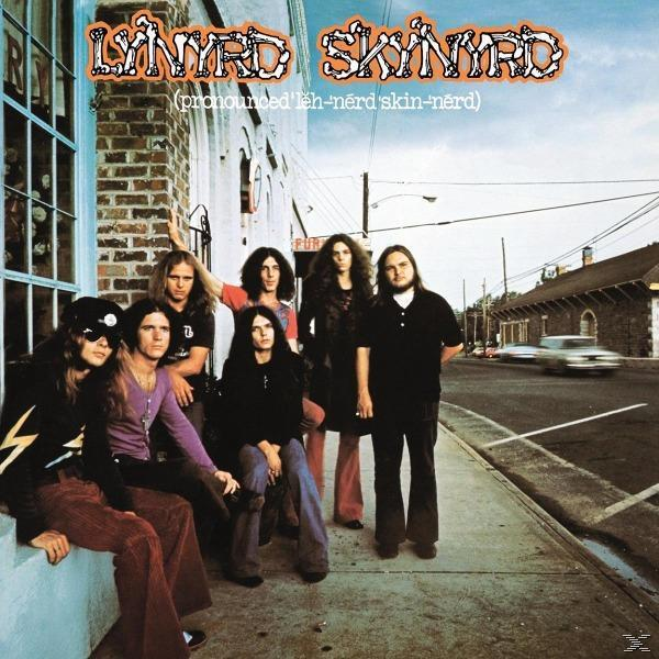 Lynyrd Skynyrd album borító, a zenekar tagjai a járdán.