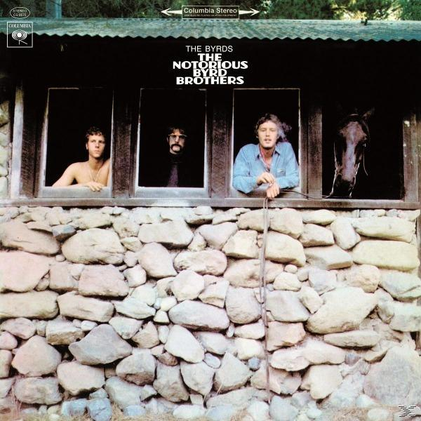 Albumcover: Drei Männer in Fenstern, Pferd im Stall. Steinmauer, Holzgebäude. Landschaft.