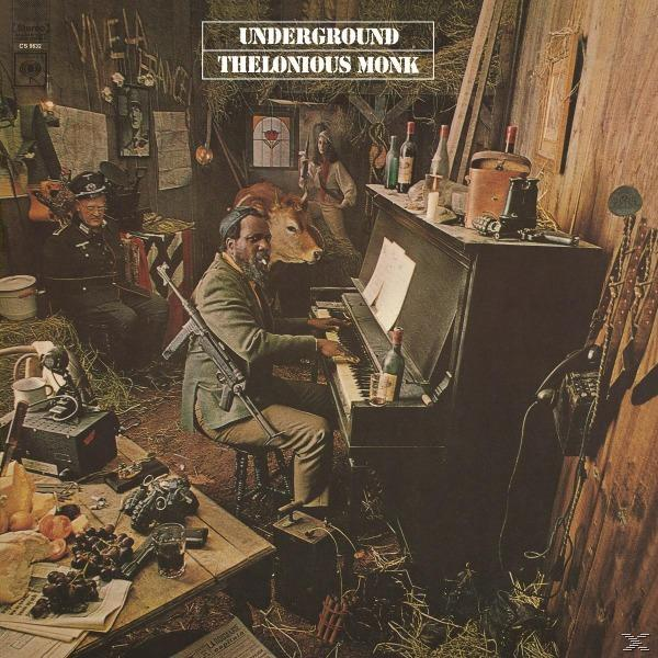 Thelonious Monk albumborítója zongorázik, egy fegyveres férfival és egy tehénnel a közelben.