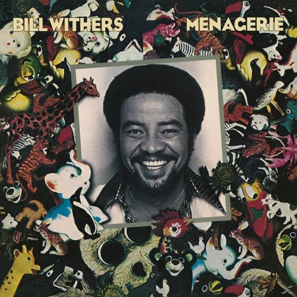 Bill Withers album borítója, egy négyzet alakú keretben, játékokkal körülvéve, az album címével a tetején.