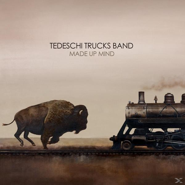 Album borító bivalyval és vonattal a síneken. Szöveg: 'Tedeschi Trucks Band Made Up Mind'.
