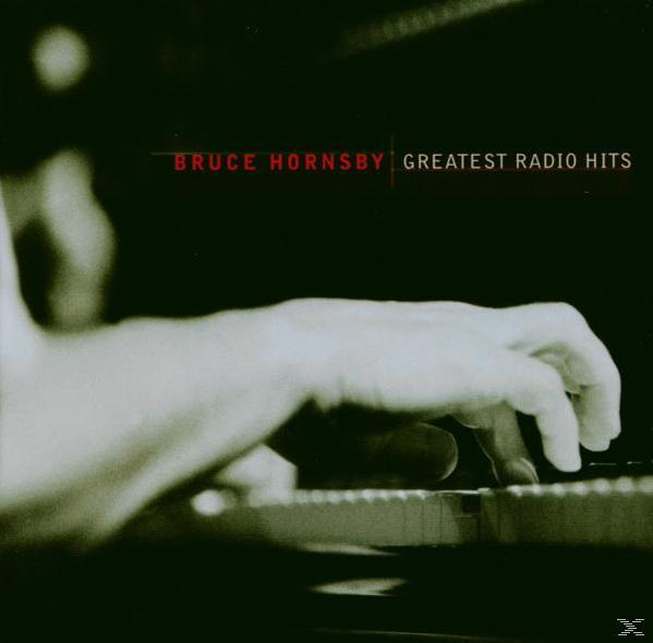 Albumcover, Hand spielt Klavier. Titel sagt 'Bruce Hornsby' und 'Greatest Radio Hits'.