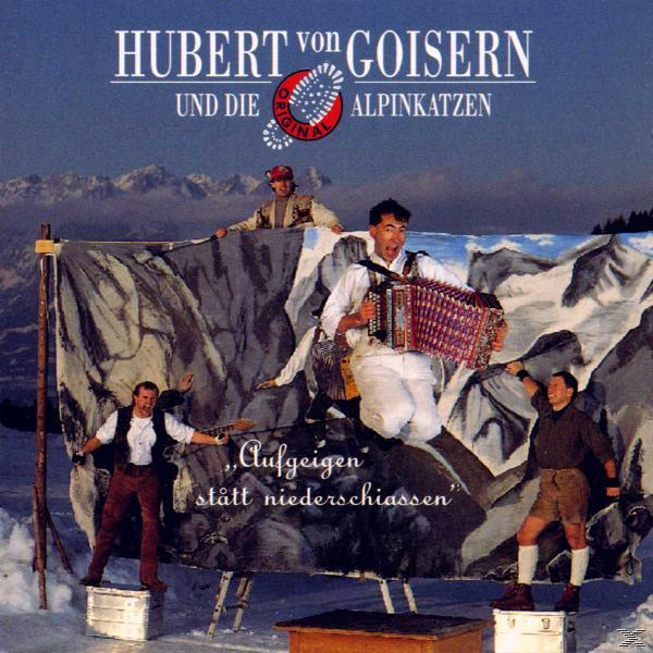 Albumcover, das eine Band zeigt, die Musik auf einer Bühne in einer verschneiten Szene spielt.