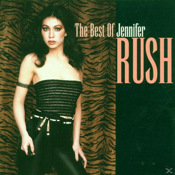 Albumcover: Jennifer Rush, trägt ein schwarzes Oberteil und steht vor einem Tigerstreifenmuster.