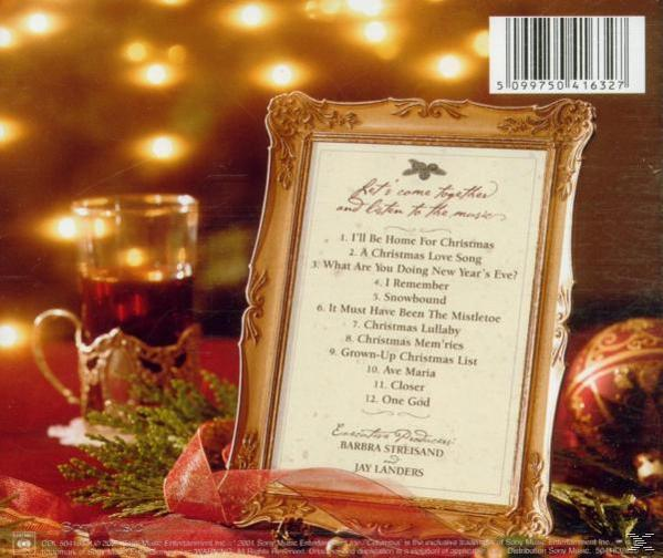 Karácsonyi témájú album hátlapja díszített kerettel és karácsonyi fényekkel.