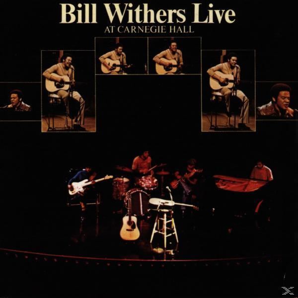 Albumcover von Bill Withers Live At Carnegie Hall. Auf der Bühne spielt eine Band.