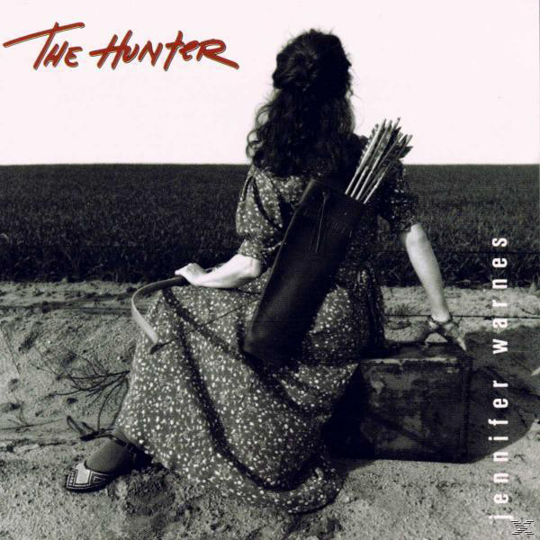Albumcover: Eine Frau mit Köcher und Pfeilen sitzt in einem Feld auf einer Kiste. Text: The Hunter, Jennifer Warnes.