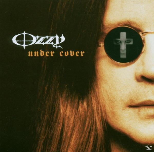 Albumcover: Ozzy Osbourne. Gesicht mit langen Haaren, Sonnenbrille mit Kreuz. Der Titel ist 'under cover'.