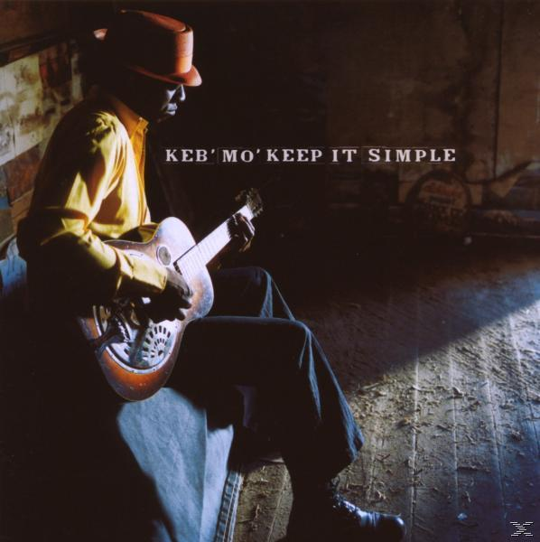 Albumcover mit einem Mann, der Gitarre spielt, einen orangefarbenen Hut trägt und dem Titel 'Keep It Simple'.