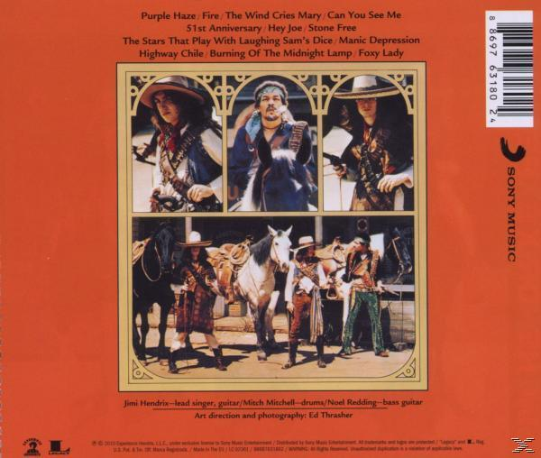 Albumcover mit Cowboys, Titelliste und Band-Credits, auf orangefarbenem Hintergrund. Sony Music Logo.