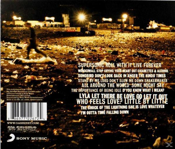 Dos du CD. Scène de concert. Paroles de chansons. Fond noir, texte blanc et jaune.