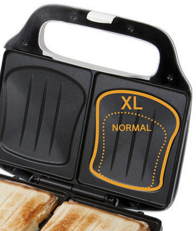 A toaster with black surface with 'XL NORMAL' marked area.