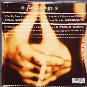 Albumcover mit einer Hand, die eine Zigarette hält. Songtitel und ein Barcode sind vorhanden.
