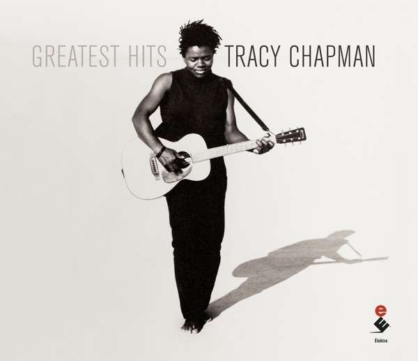 Album borító. Tracy Chapman gitárral. Fekete ruházat. Fehér háttér.