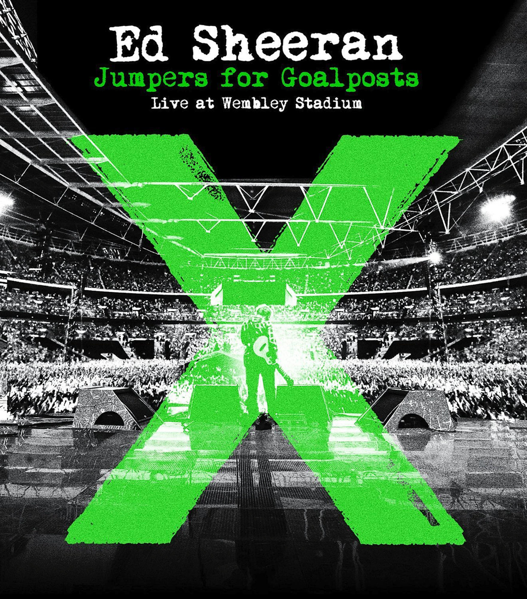 Ed Sheerans 'Jumpers for Goalposts' Cover. Grünes X, Bühne und Publikum im Wembley-Stadion, schwarzer Hintergrund.