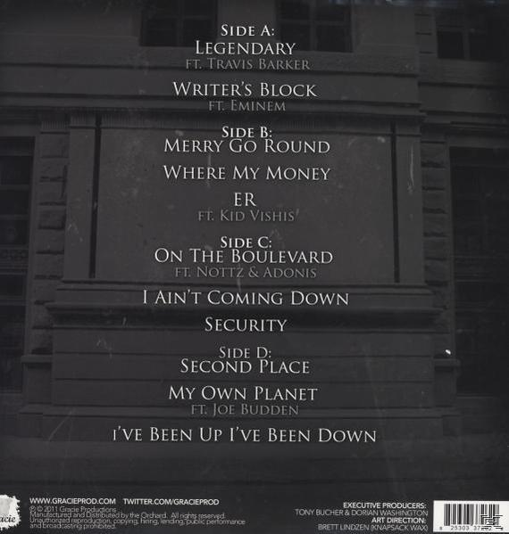 Album-Rückseite mit Songtiteln und Credits vor Stein-Hintergrund.