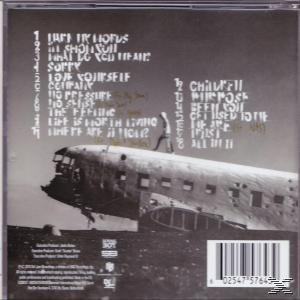 Album-Rückseite, Schwarzweiß, abgestürztes Flugzeug, Titelliste, Text, Barcode.