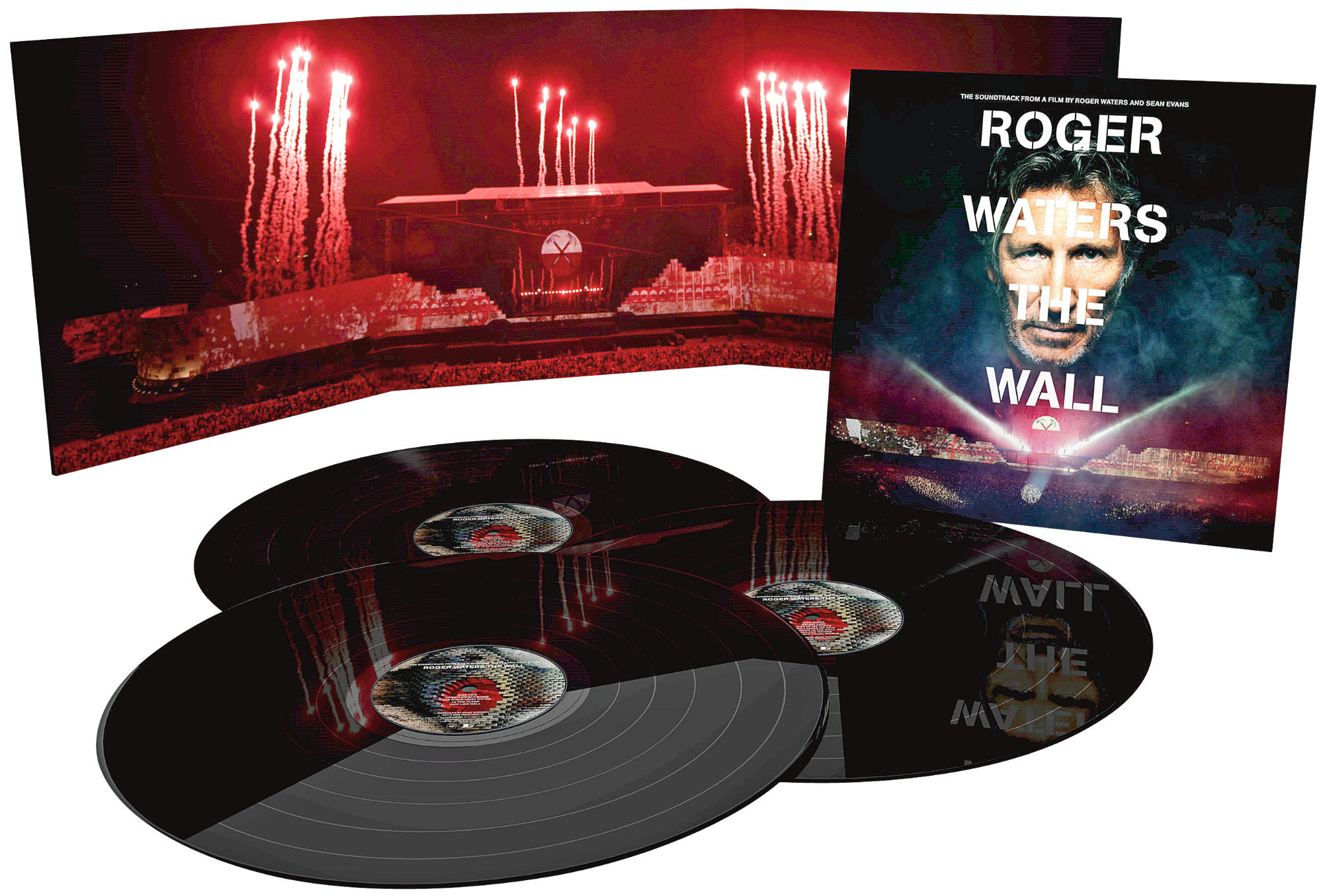 Hanglemezkészlet Roger Waters filmplakátjával. Tüzijáték egy színpad felett. A cím: 'The Wall'.