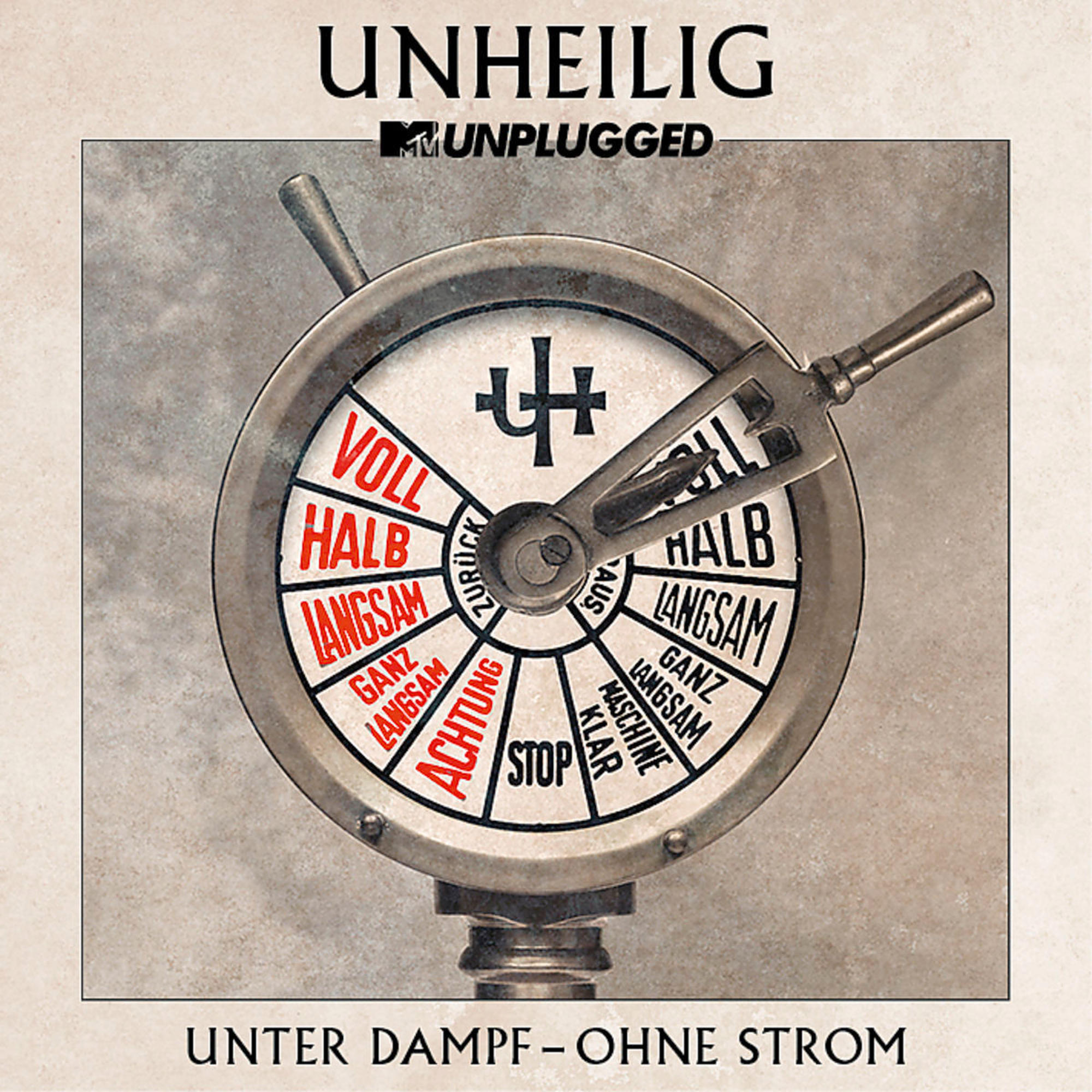 Albumcover mit einem Bedienfeld und dem Text 'UNHEILIG'. Grauer Hintergrund.