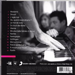 CD-Cover eines Klavierspielers. Die Hände spielen Klavier, mit verschwommenem Hintergrund.