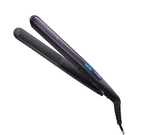 Siyah ve mor Remington saç düzleştirici. Beyaz bir zemin üzerinde açılı çekim. Dijital ekran.