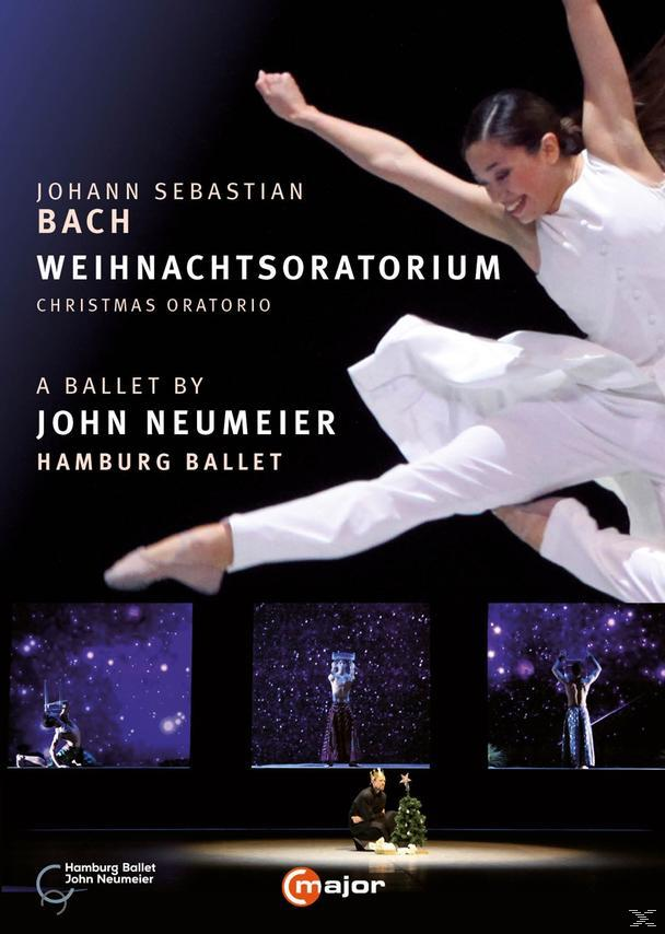Ballettänzer in der Luft. Darunter eine Bühnenszene. Titel: Johann Sebastian Bach. Hintergrund: Bühnenszene.