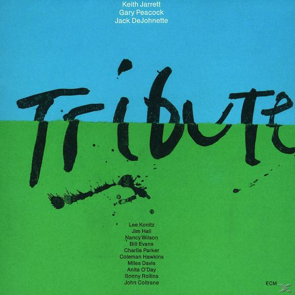 Album borító: fekete 'Tribute' szöveg, kék-zöld háttér, előadók nevei.