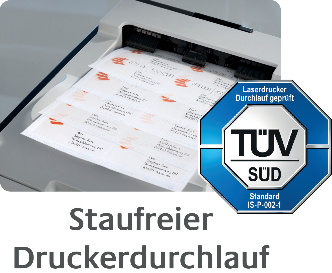 Ein Etikettendrucker druckt Etiketten. Ein Aufkleber mit Text "Staufreier Druckerdurchlauf" und TÜV SÜD Siegel.