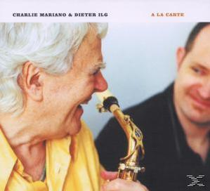 CD-Cover mit zwei Männern, einer spielt Saxophon. Der Titel lautet A La Carte, von Charlie Mariano & Dieter Ilg.