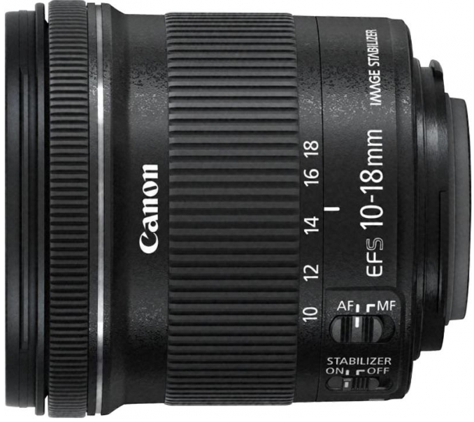 Black camera lens with text and numbers. It's a Canon EFS 10-18mm lens.