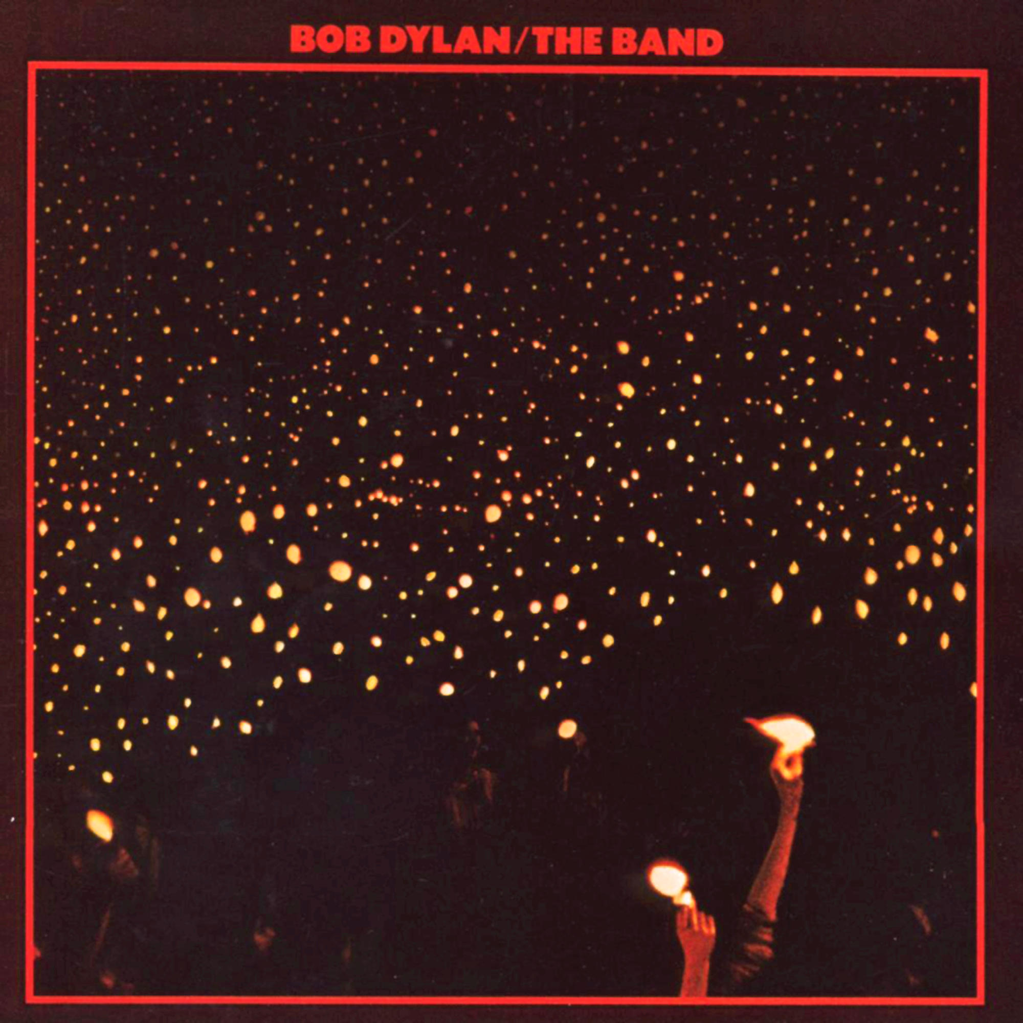 Albumcover für Bob Dylan/The Band. Dunkler Hintergrund mit vielen gelben Lichtern und Silhouetten.