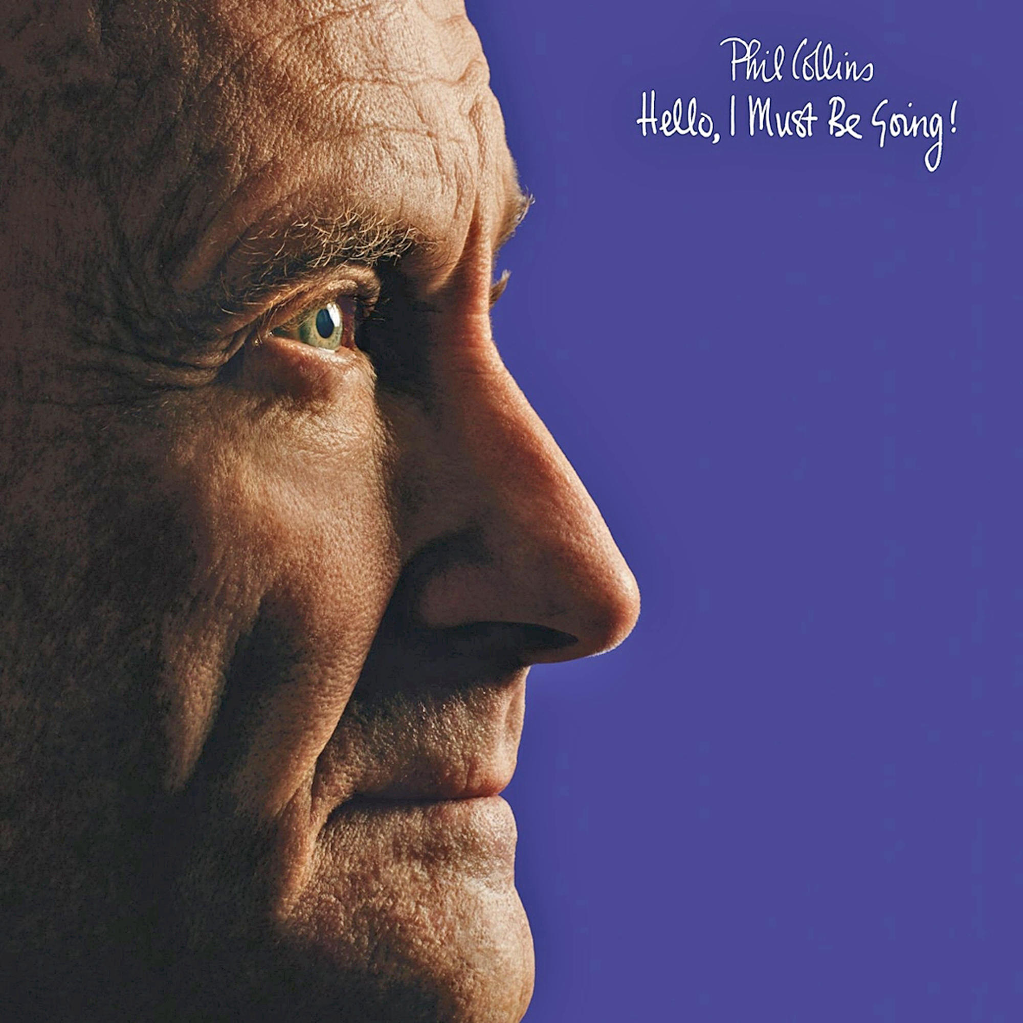Egy kopasz fejű férfi közeli profilportréja, 'Phil Collins' felirattal és album címmel.