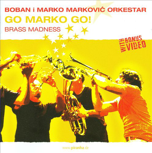 Album borító sárga színű zenekari tagokkal. A szöveg a következő: GO MARKO GO! BRASS MADNESS. Van rajta egy bónusz videó.