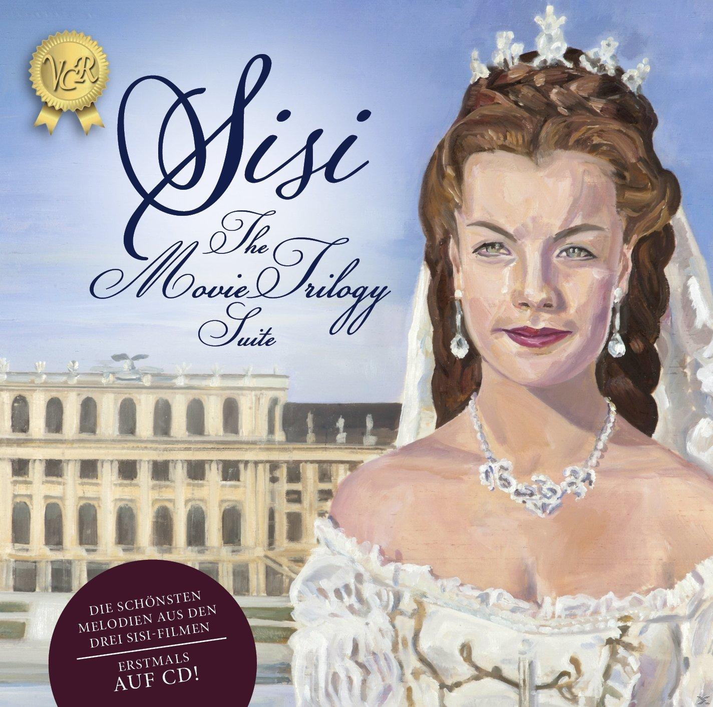 Albumcover: Frau in weißem Kleid, Tiara und Schleier. Text: Sisi, The Movie Trilogy Suite. Hintergrund zeigt ein Gebäude.
