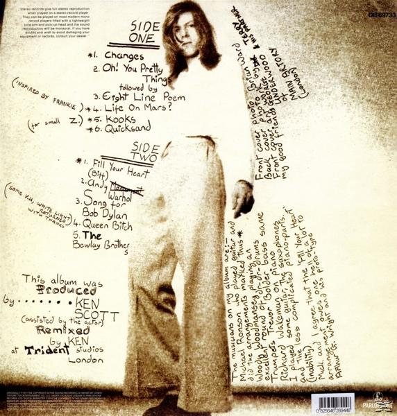 Album-Rückseite mit handschriftlichem Text, Foto eines Mannes und Trackliste. Weißer Hintergrund.