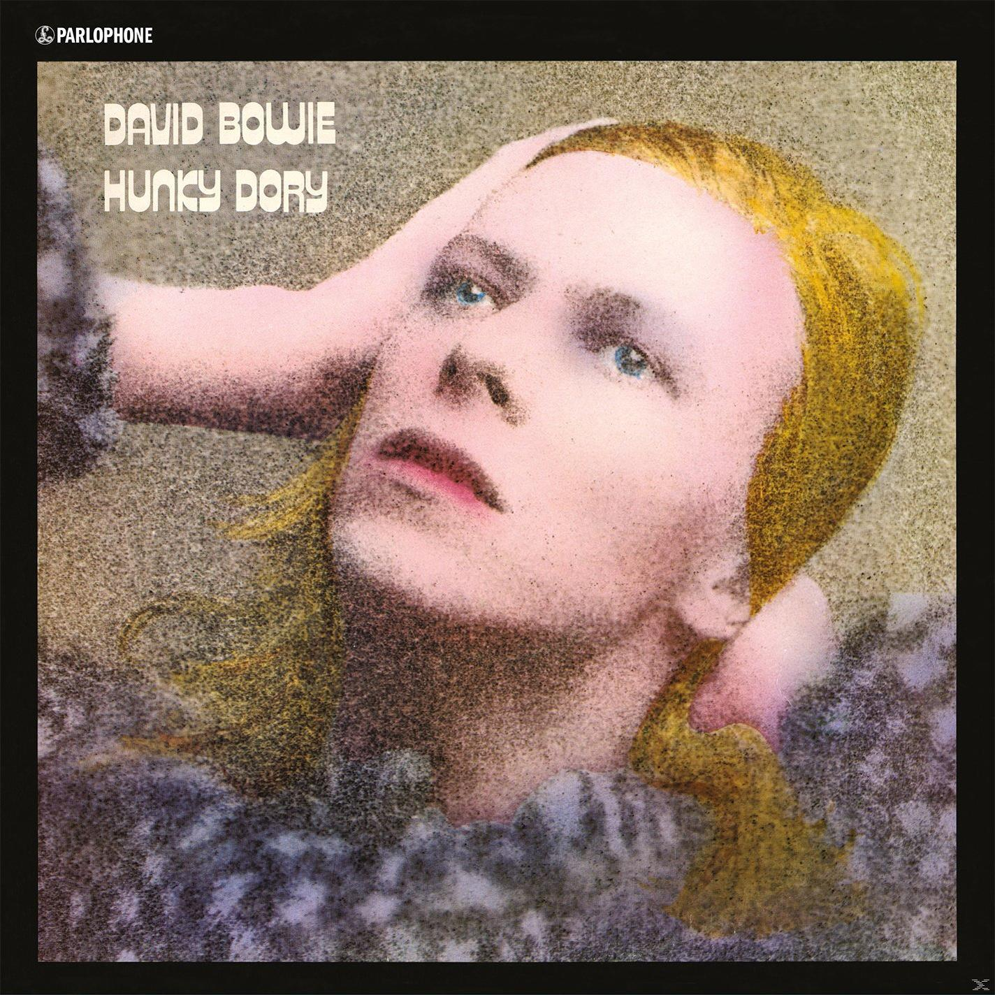 David Bowie Albumcover. Nahaufnahme seines Gesichts. Titel 'Hunky Dory' und Künstlername.