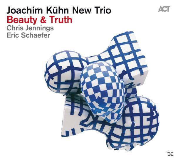 CD-Cover. Abstrakte Kunst mit blau-weißen Quadraten. Der Text lautet Joachim Kühn New Trio.