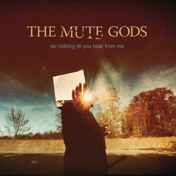 Albumcover mit einer Person, die einen Spiegel zur Sonne hält, mit dem Text 'THE MUTE GODS'.