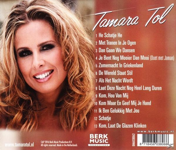 Albumcover met een lachende vrouw met blond haar, met een tracklist aan de rechterkant.