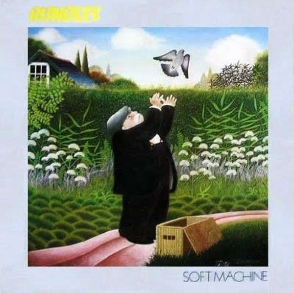 Album borító egy férfival, aki egy madarat enged szabadon egy mezőn, dobozzal és Soft Machine szöveggel.